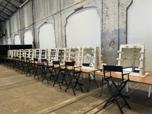 Make up Mirrors, trestle tables and director chairs set up at carriageworks